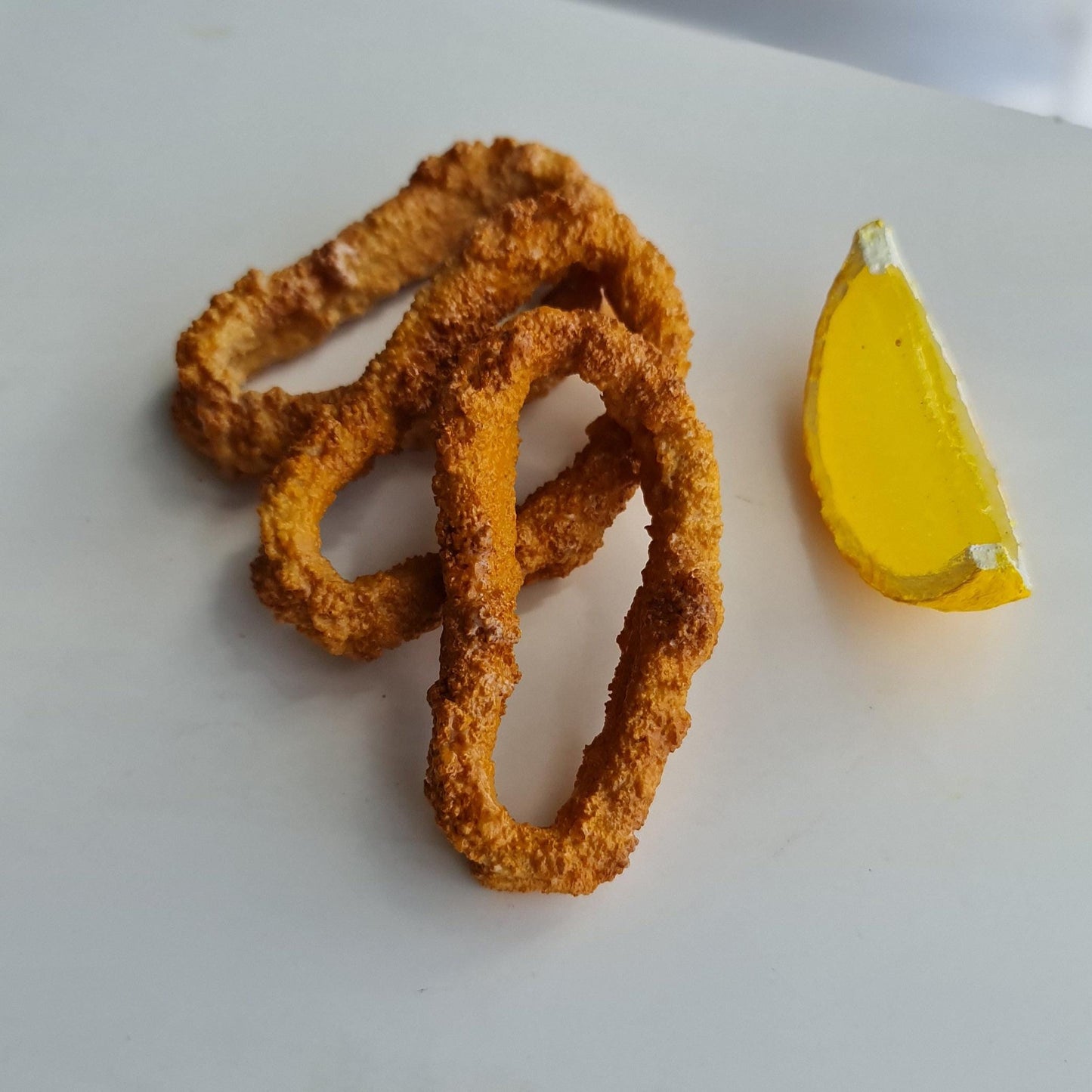 Realistic Fried Calamari Set: Faux Seafood Display with Lemon