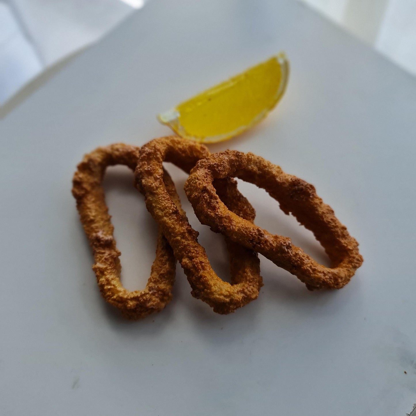 Realistic Fried Calamari Set: Faux Seafood Display with Lemon